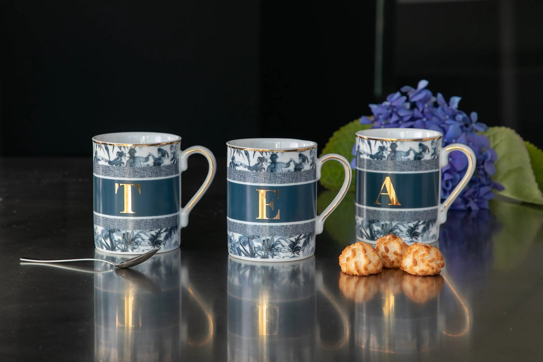 Alfabet alphabet mugs — blue toile-print porcelain with gold monogram letters by Amprio Milano
