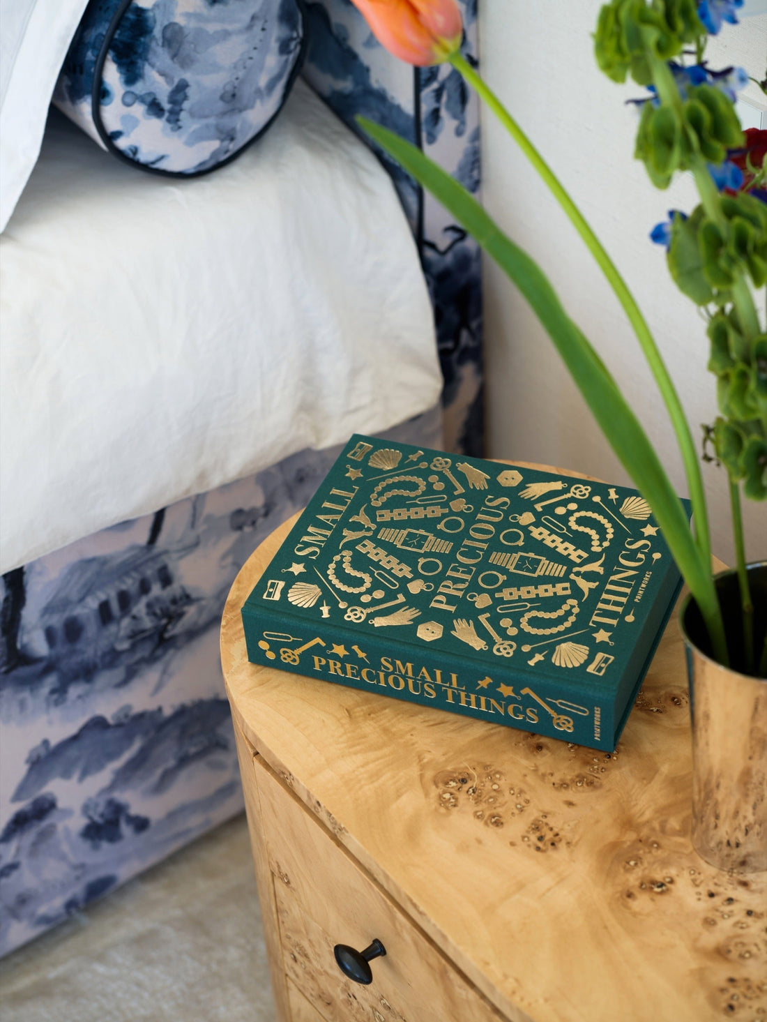 Green Printworks Small Precious Things keepsake box with gold foil detailing on a burl wood nightstand