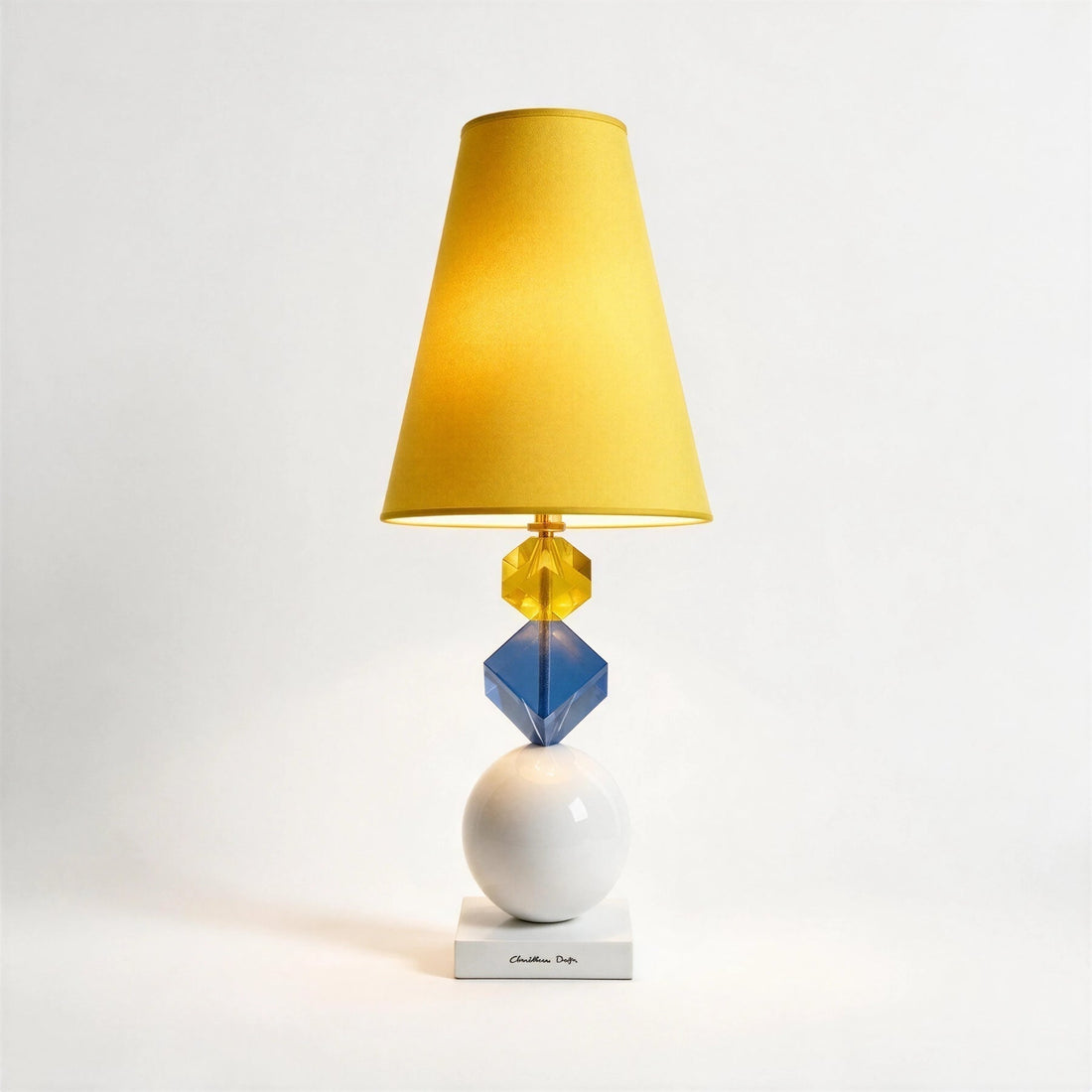 Charlottina Mia Citrino table lamp with a yellow cotton shade, topaz and blue resin cubes and a white sphere base