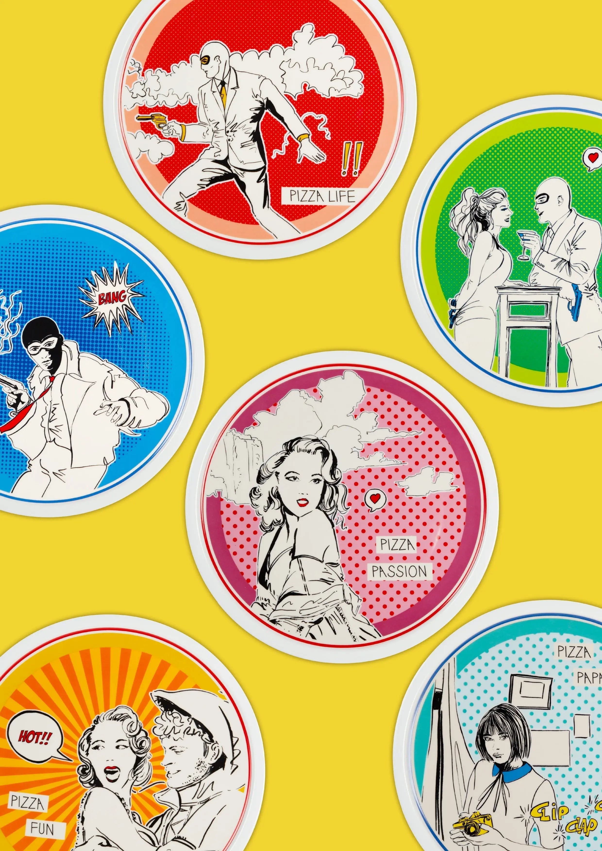 Gulp plate set — pop-art pizza plates in bold colours with comic graphics by Amprio Milano