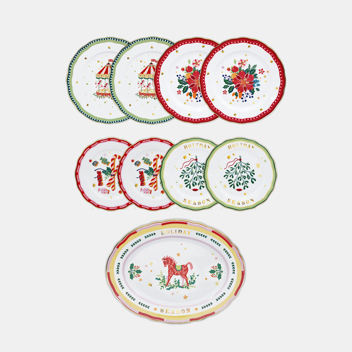 Mamma Mia Xmas plates set—festive plates and oval platter with carousel, poinsettia, mistletoe and rocking horse motifs by Amprio Milano.