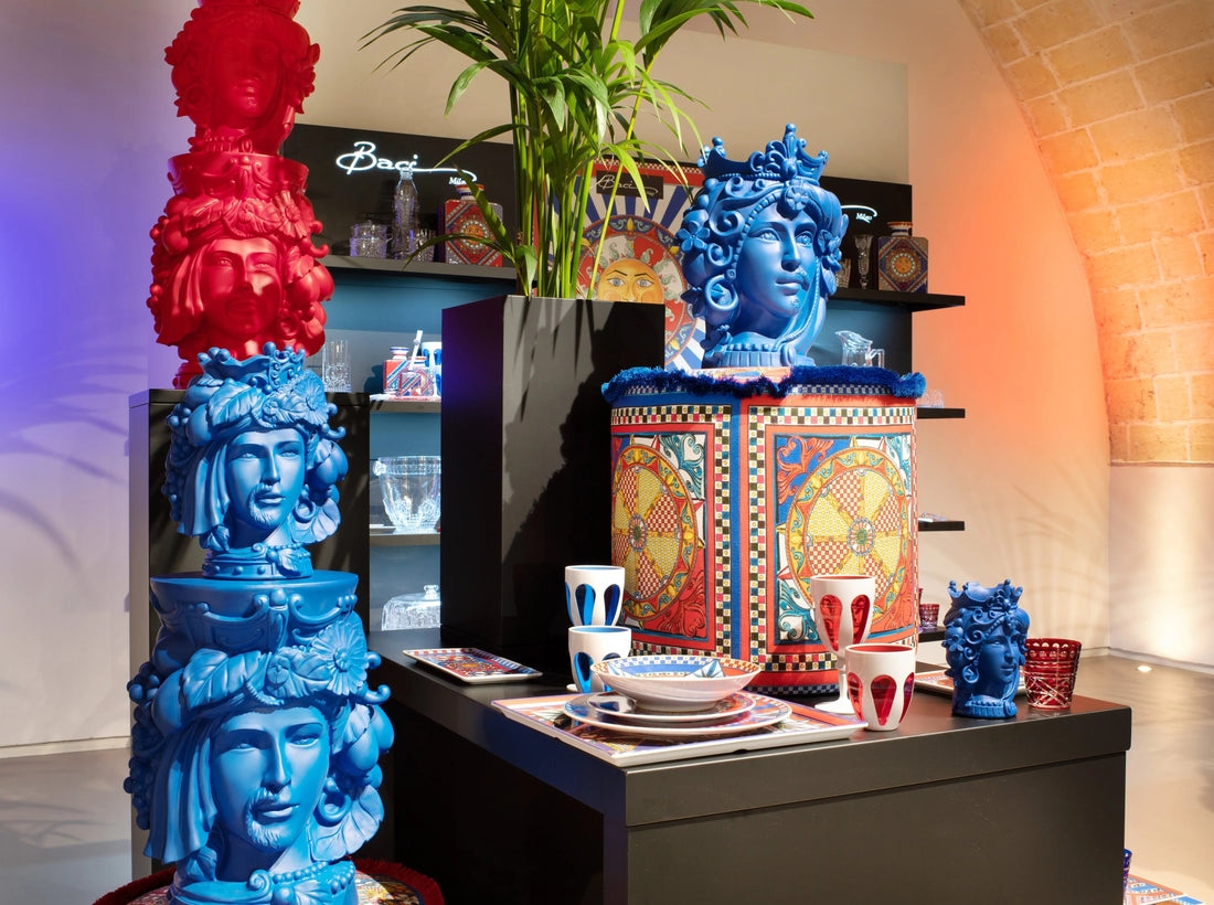 Sole Mio collection — Sicilian-inspired ceramics and tableware with bold colours, Moorish-head vases and patterned plates by Amprio Milano